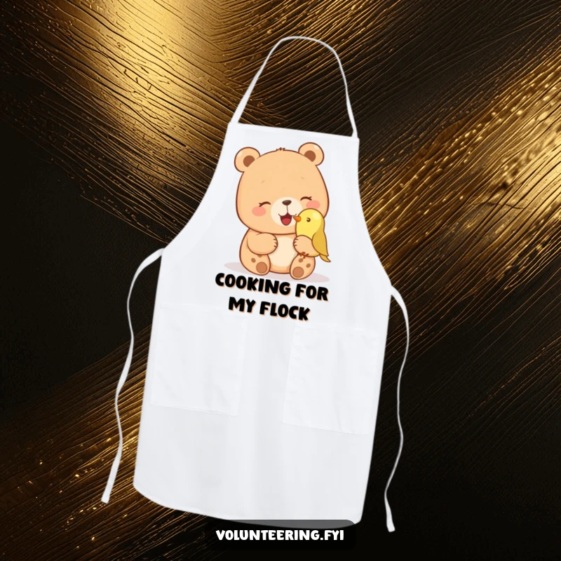 Funny apron featuring a giggling bear petting a small bird on its nose, perfect for humorous kitchen antics. Great funny gift.