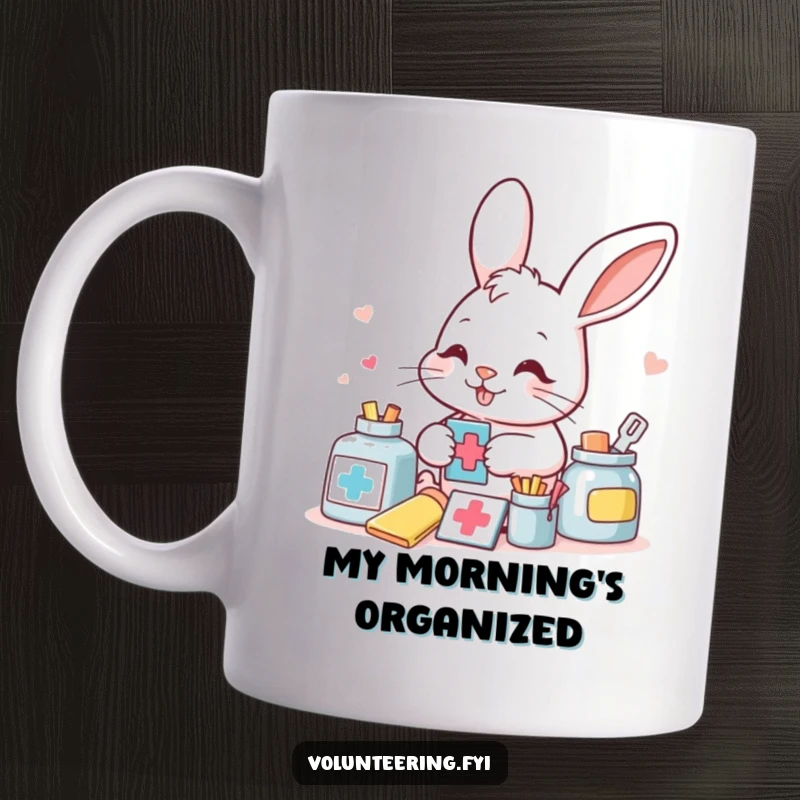 Funny smiling bunny meticulously sorting colorful aid supplies with a determined look, depicted on a mug for organized fun.