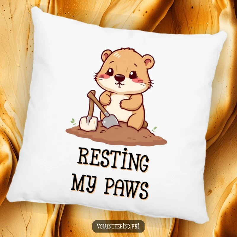 Funny pillow design featuring a determined beaver smoothing soil with a small shovel, bringing construction whimsy indoors.