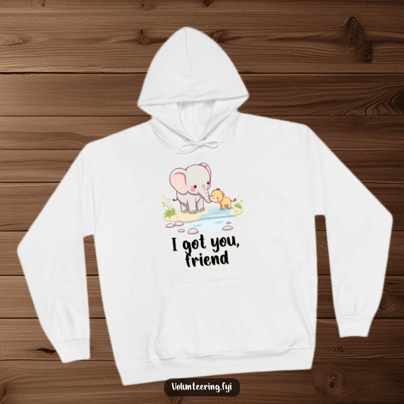 Funny kawaii elephant hoodie featuring a large gentle elephant guiding a small animal across a stream, promoting themes of friendship and support.