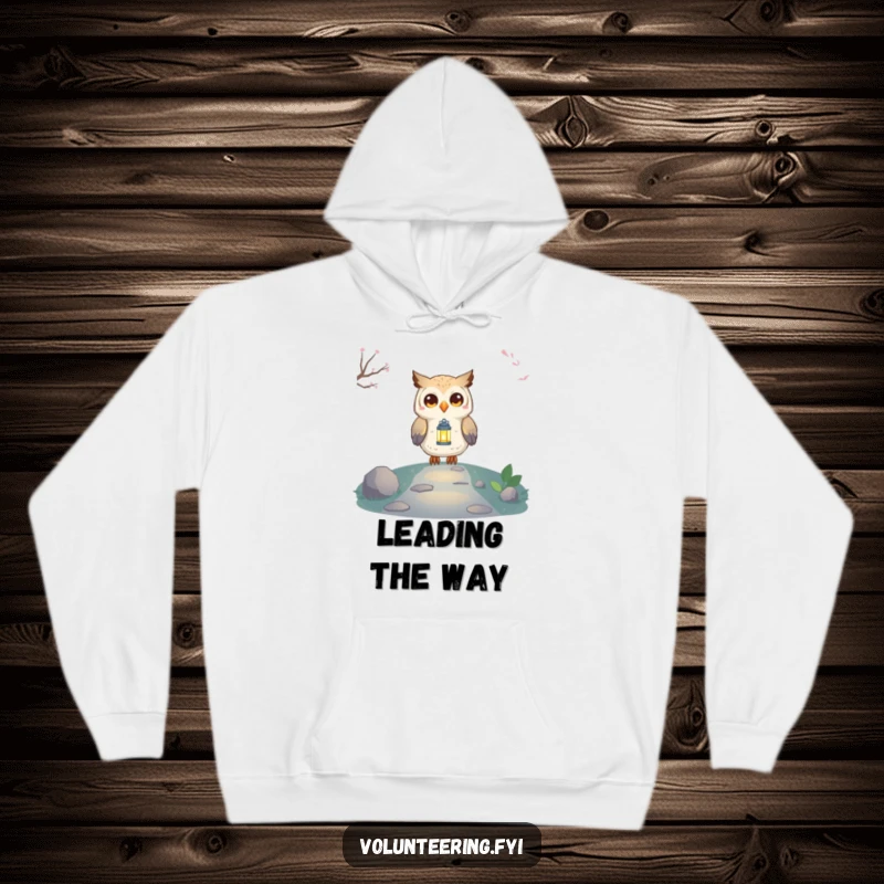 Funny Owl Lantern Hoodie featuring a proud, smiling owl character illuminating a path with a small, glowing lantern, perfect for cozy nights.