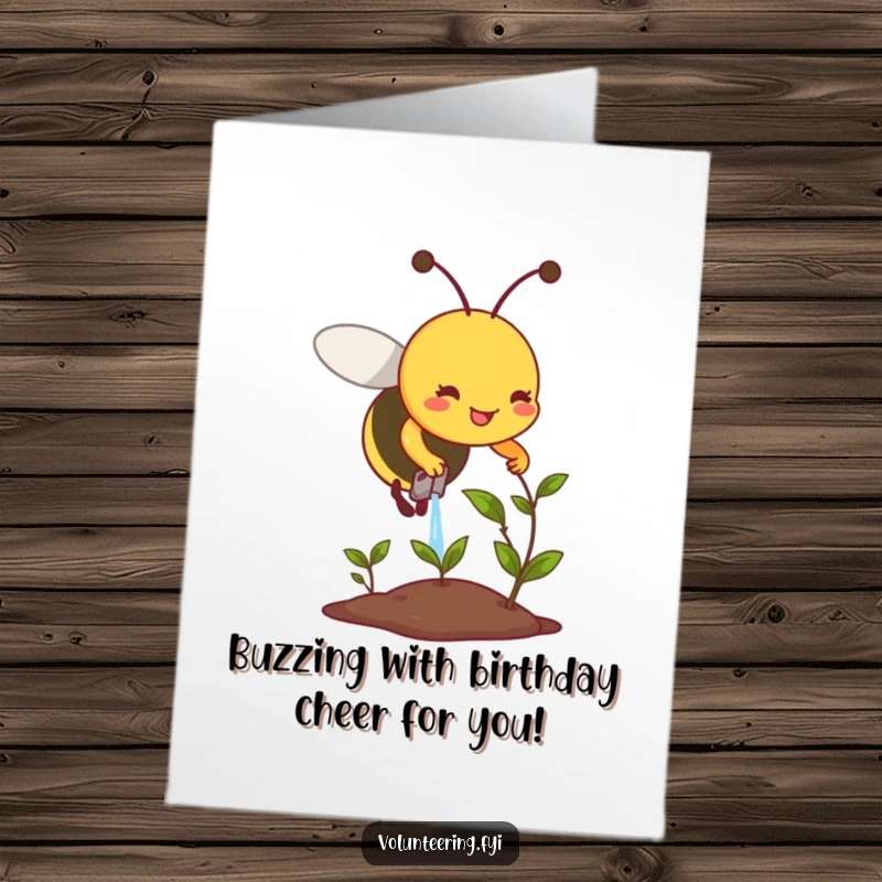 Funny free printable birthday card showing a diligent smiling bee carefully watering a small, wilting plant, bringing it back to life.