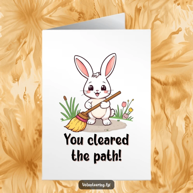 Funny free printable congratulations card showing a smiling rabbit sweeping a path, representing a clear and successful journey ahead.