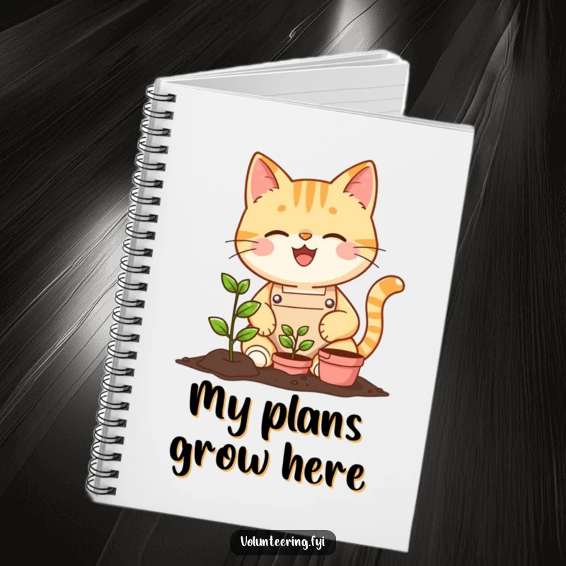 Funny cheerful cat wearing an apron planting a tiny seedling on a notebook, for humorous gardening notes.