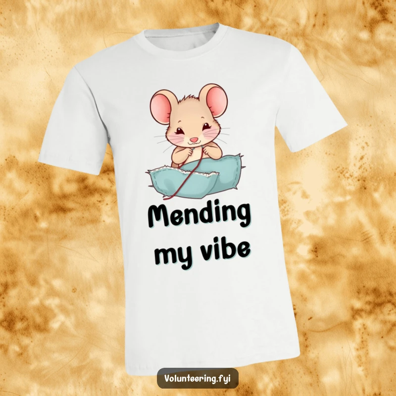 Funny mouse t-shirt, a contented character sewing a tear in fabric with miniature tools, a cute and humorous apparel gift.