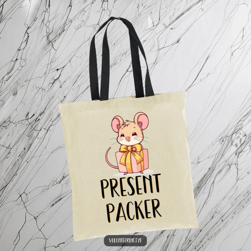 Funny tote bag with a determined mouse tying a ribbon around a gift, ideal for carrying essentials with a gifting theme.